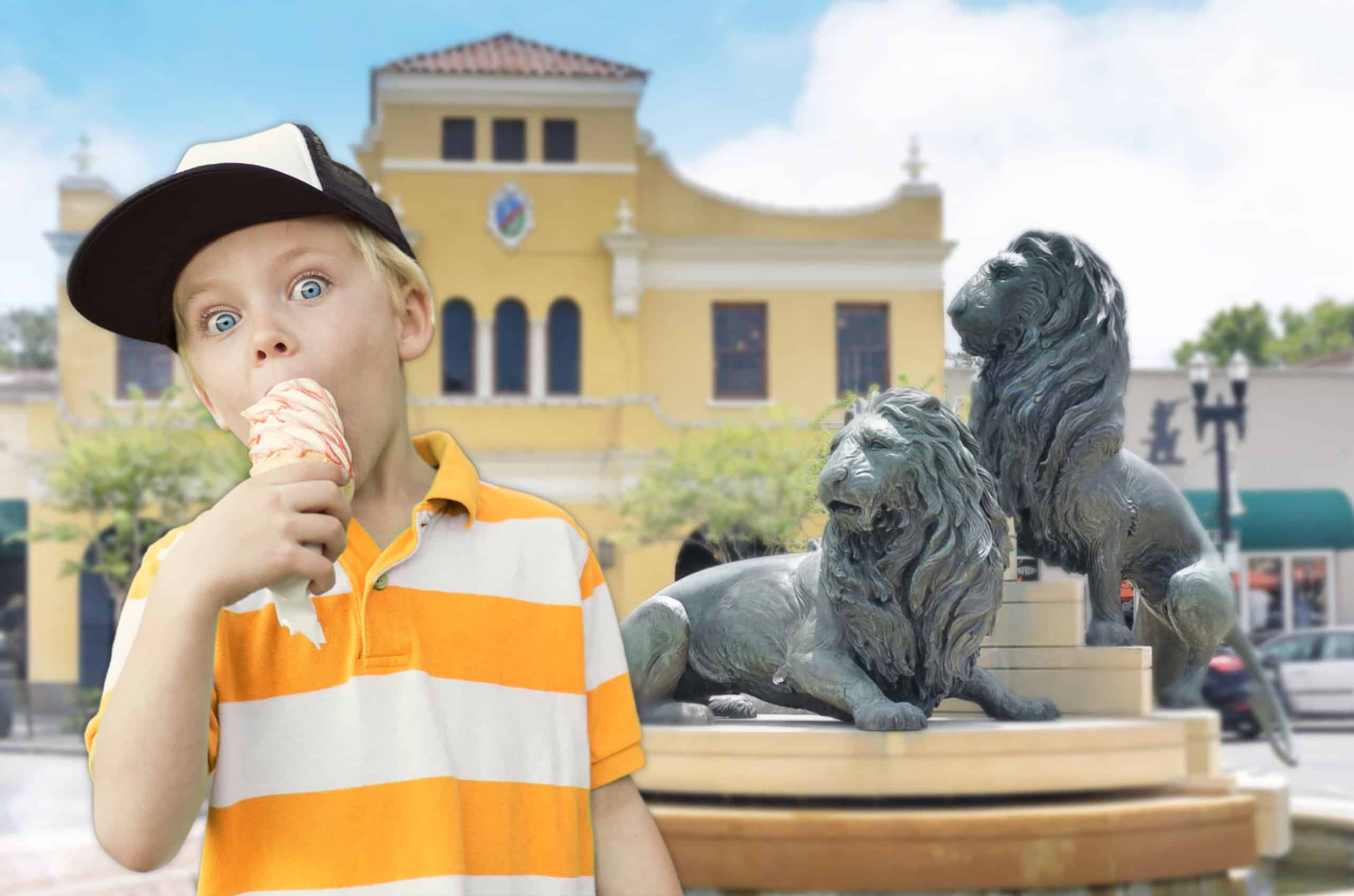 Young boy eating the best San Marco Dreamette ice cream cone in Balis Park with lion statues in the background of Jacksonville Florida